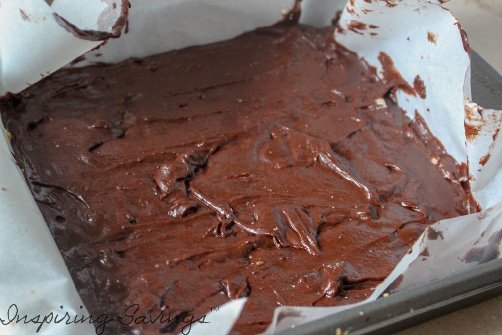 Brownie batter mix spread evenly over shortbread