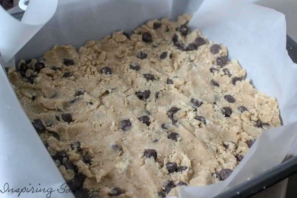 Shortbread batter spread evenly in pan, ready to bake