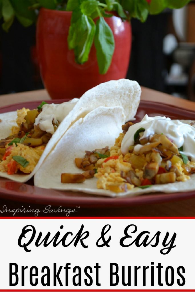 Breakfast Burritos on red plate ready to serve on red plate with sour cream