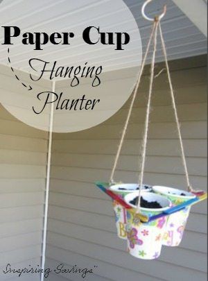 This ingenious planter, made from a paper drinking cups, is a fascinating science project, a lovely hanging planter, and a clever space-saver all in one. It brings seedlings closer to the sun and your family even closer to springtime! Growing plants from seedling can be fun. Perfect craft for toddlers or young kids. #gardening #tips #crafts