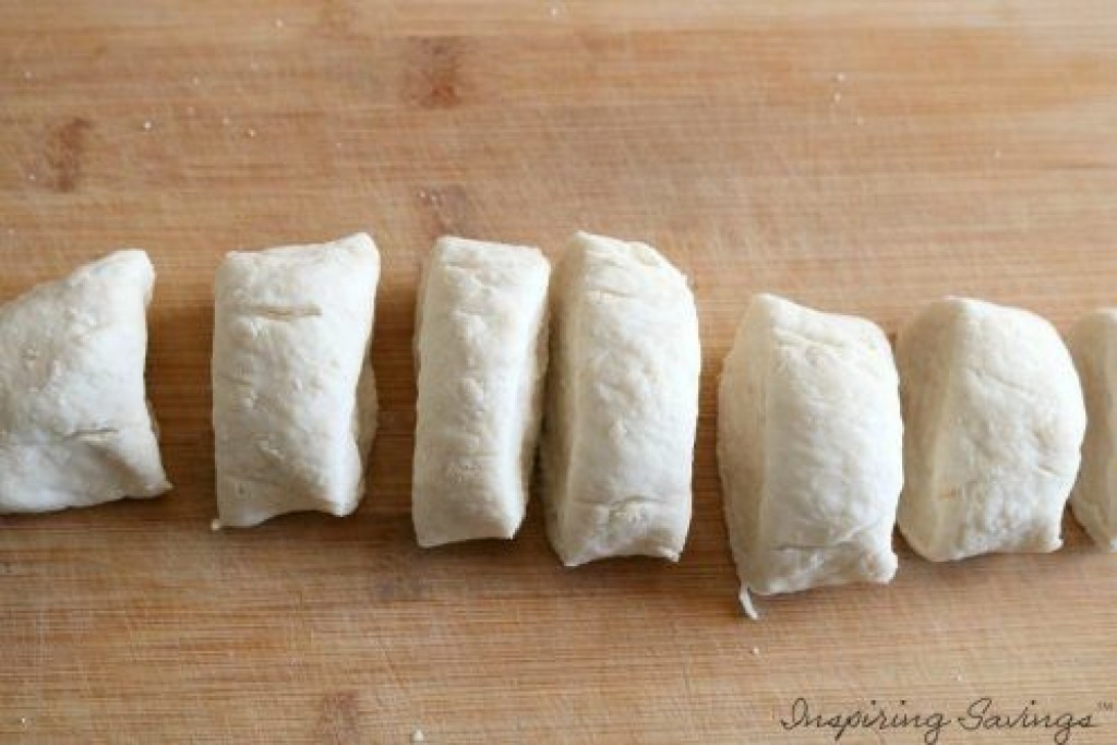 Cutting bread Dough on cutting board - Buffalo Chicken Stuffed Bread Bites