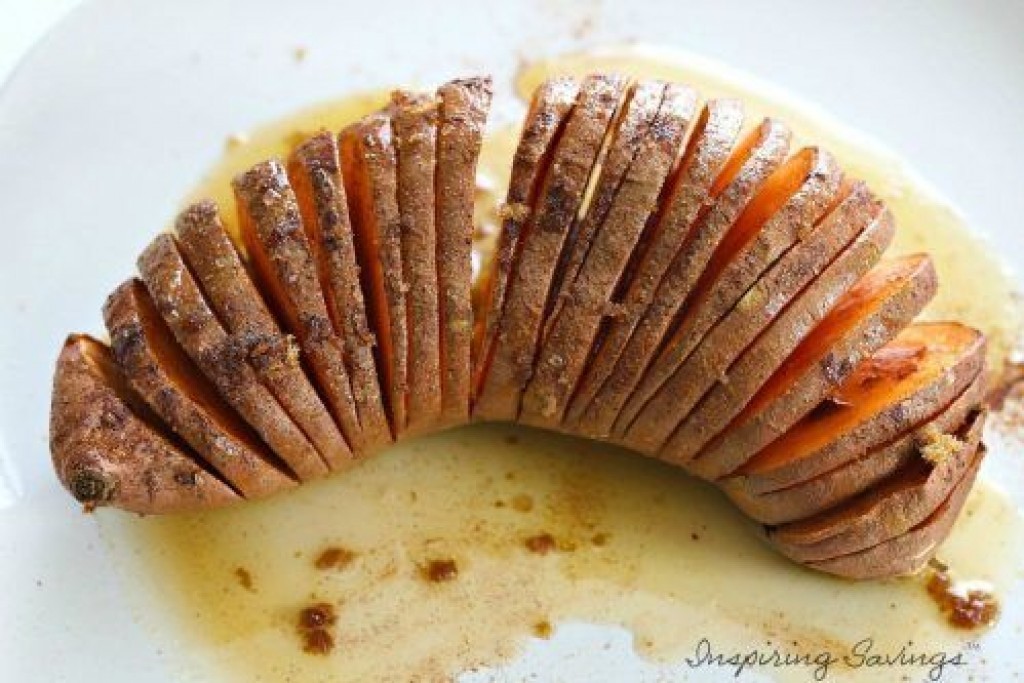 Hasselback Sweet Potatoes with Brown Butter finished on white plate ready to eat.
