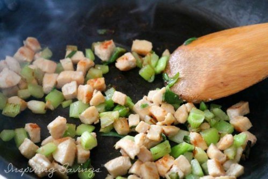 Cooking Shopped Chicken and Celery in pan