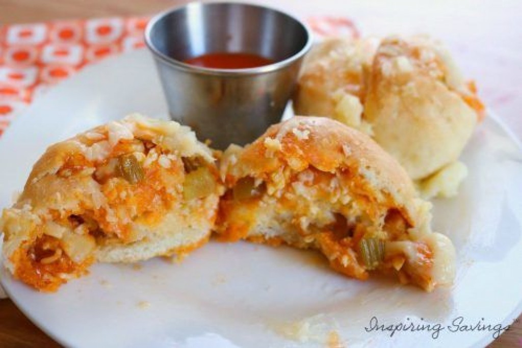 Buffalo Chicken Stuffed Bread Bites on white plate with dipping sauce