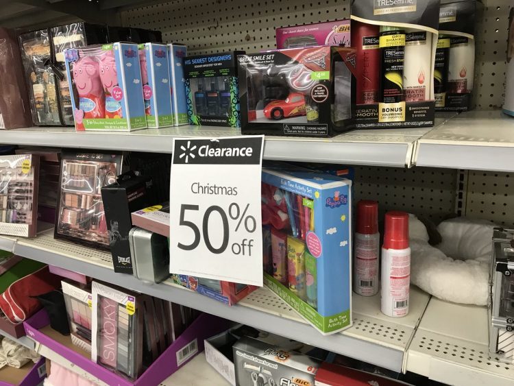 Personal gift sets on sale after christmas with sign that states 50% off