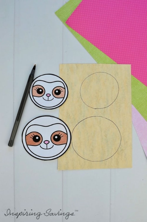 Coloring sloth faces with colored pencils