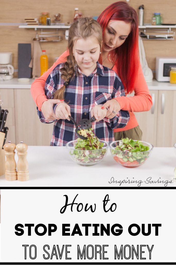 How to stop eating out to save more money - pictured woman and daughter cooking a meal at home