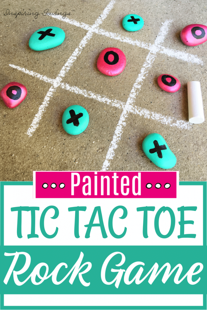 outside playing Tic Tac Toe with painted rock set - DIY craft