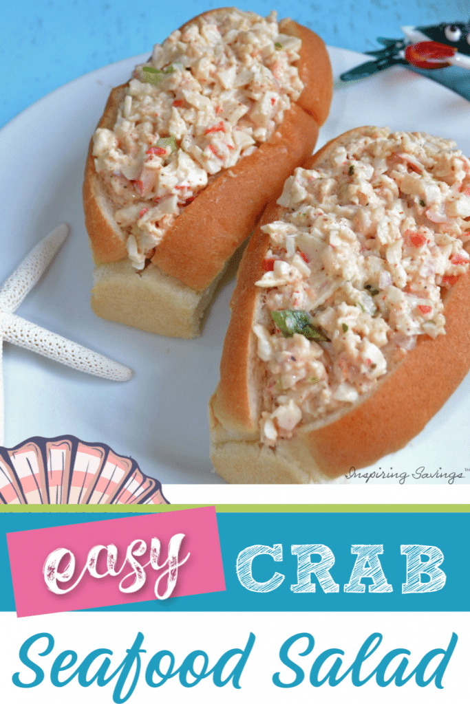 Two rolls filled with crab seafood salad on white plate