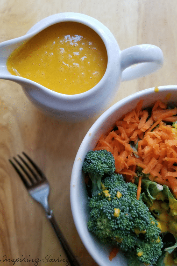 Creamy carrot ginger salad dressing with salad