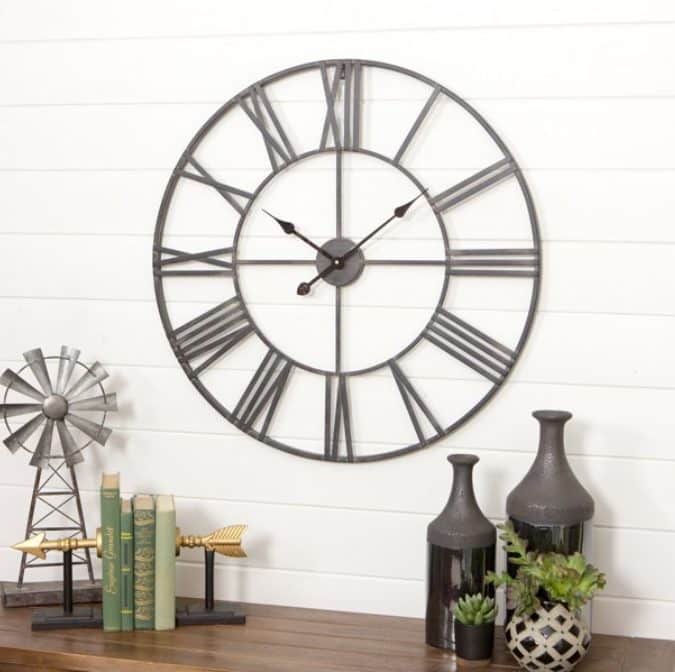 Farmhouse style clock on shiplap background