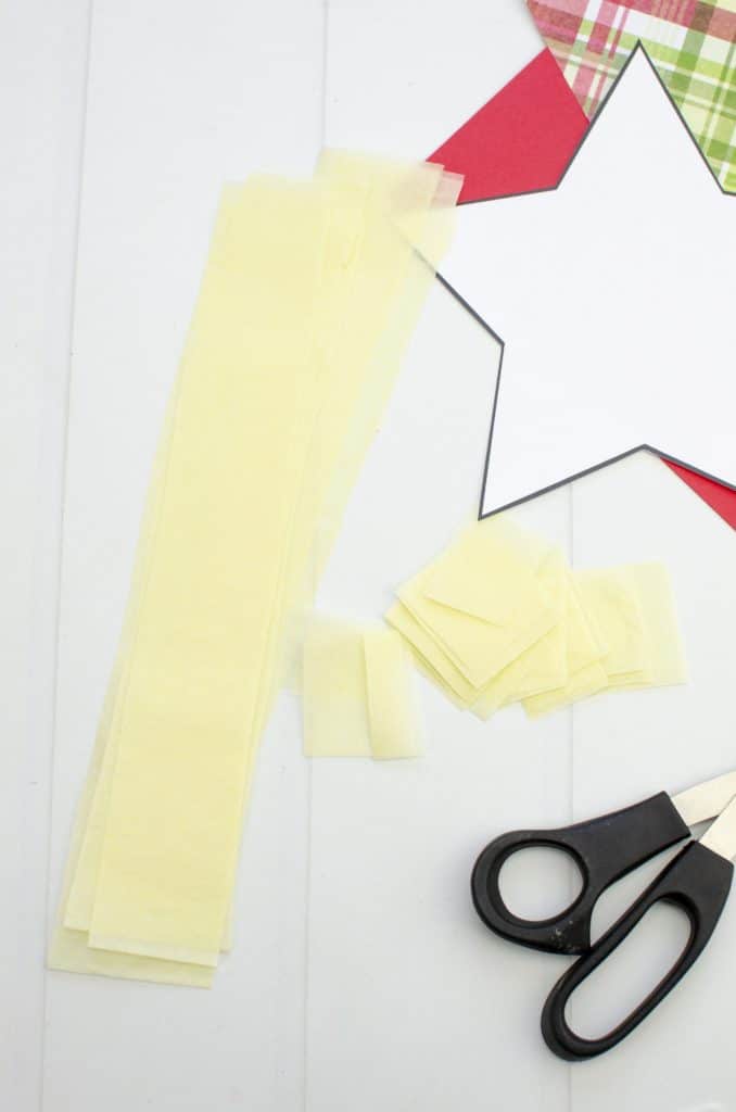 Cutting Yellow Tissue paper into strip for craft project