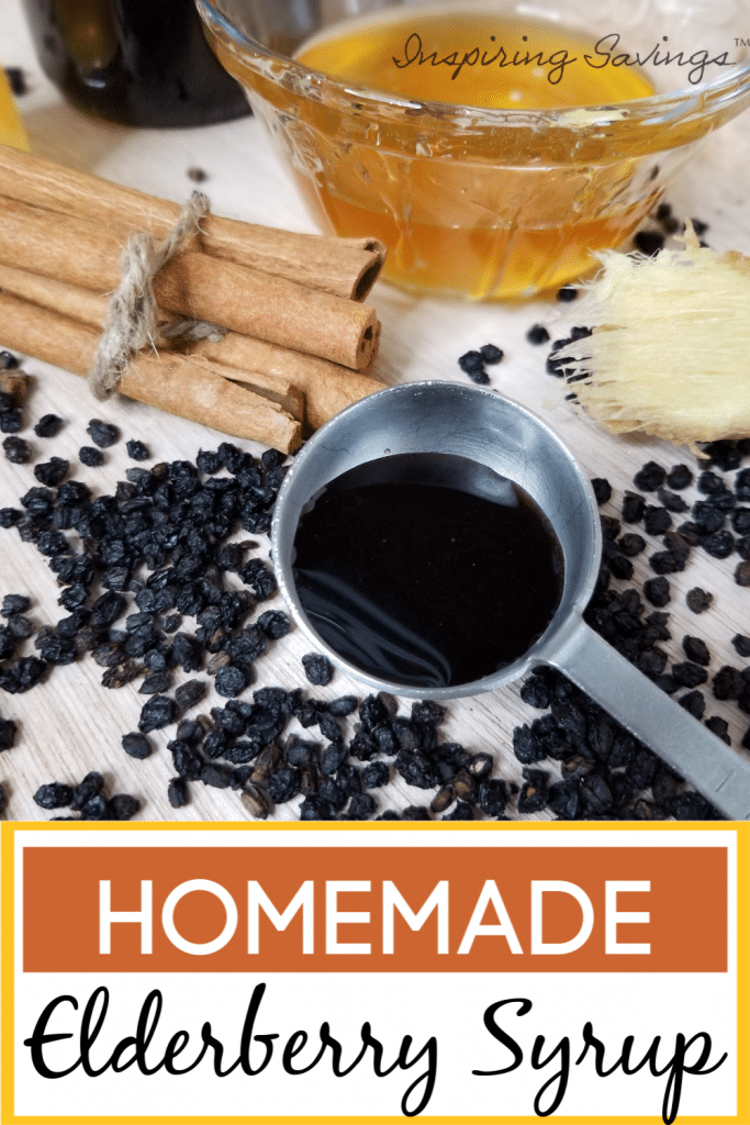 Homemade Elderberry Syrup in tablespoon on table