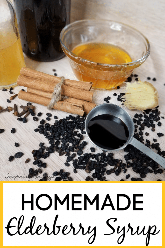 Homemade Elderberry Syrup is a natural anti-viral. on table with elderberries