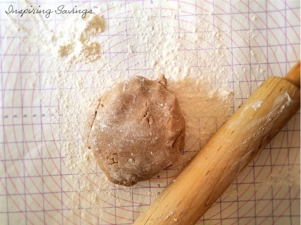 Gingerbread Cookie Dough ball on floured surface