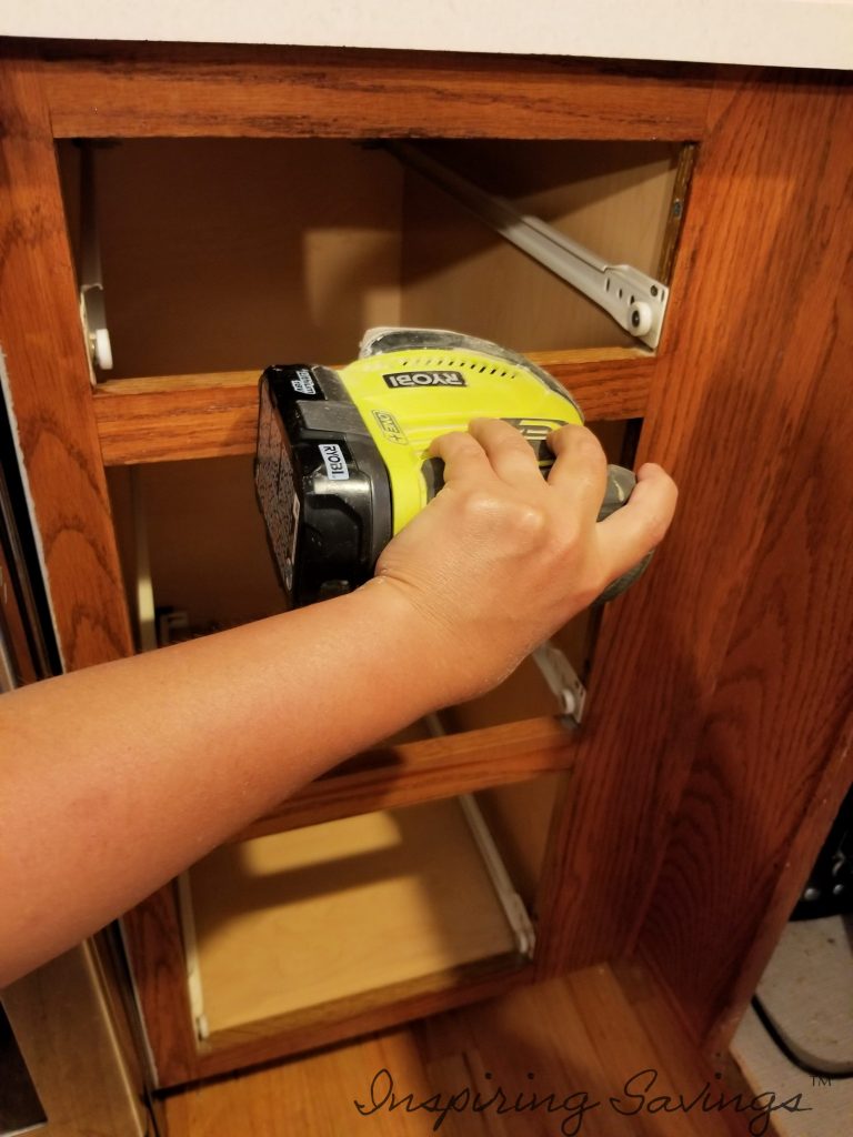 The Best Way to Paint Kitchen Cabinets - Sanding Cabinets with hand sander