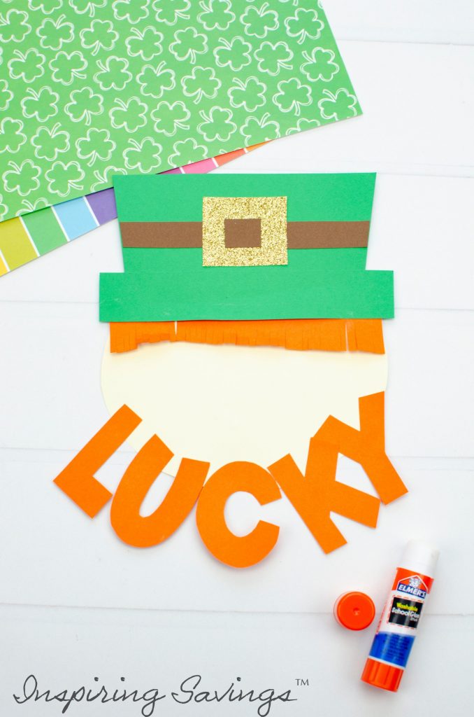 Adding The lettering "Lucky" To the Leprechaun craft