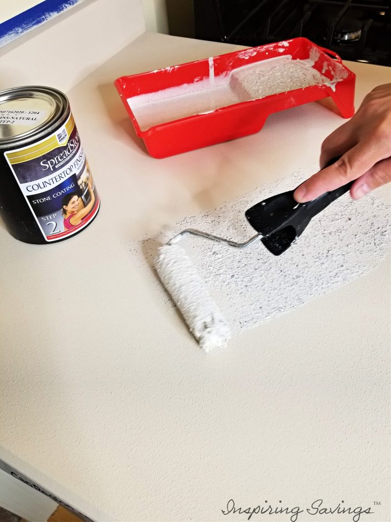 Applying step 2 of refinishing kit - kitchen counter refinishing kit