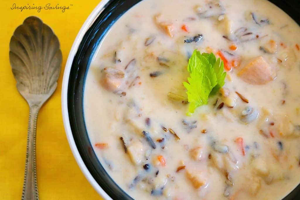 creamy chicken and rice soup in a bowl.