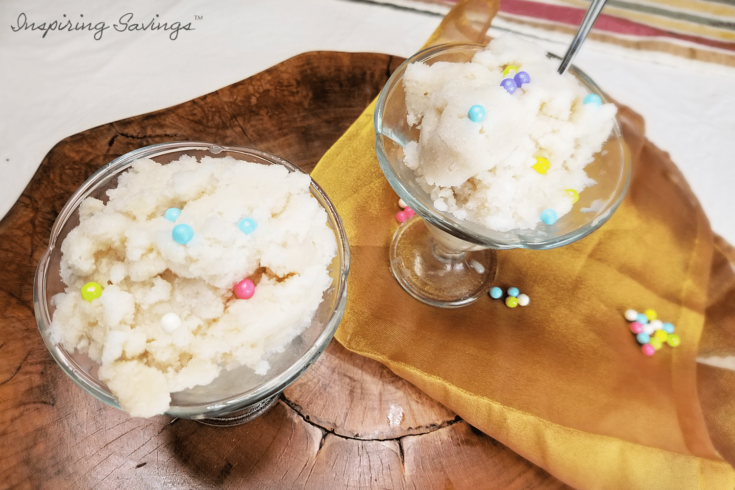Homemade Snow Ice Cream in bowls on wooden background