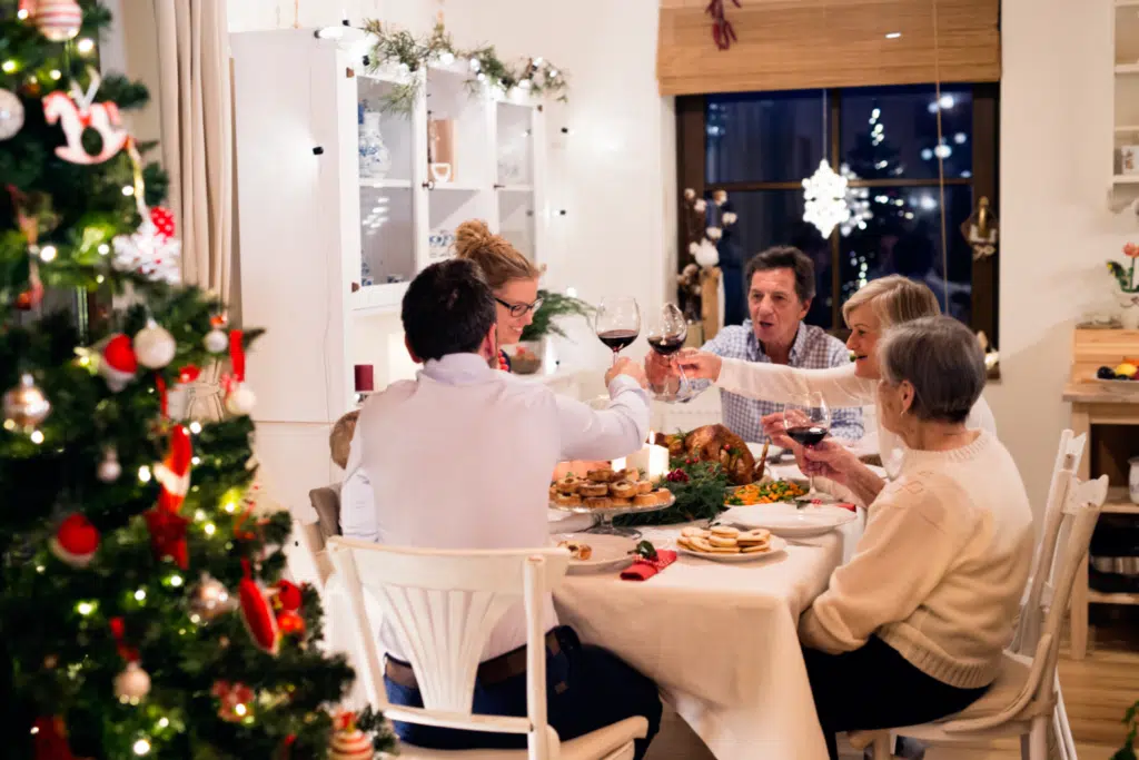 Christmas family dinner - gathered at the dinner table