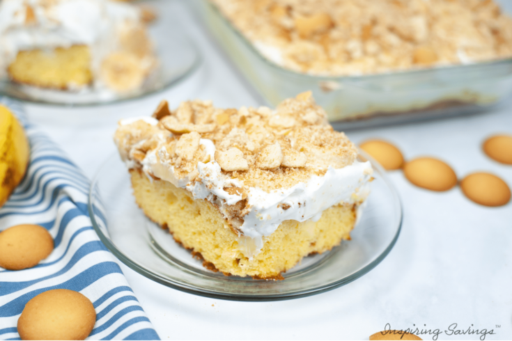 Banana Poke Cake on clear plate