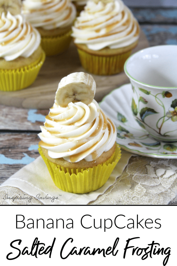 Banana Cupcakes with Salted Caramel Frosting on wooden background with a teacup