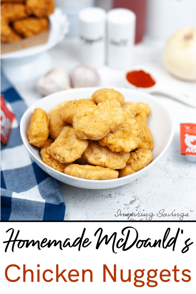 Homemade Copycat McDonald's Chicken Nuggets in white bowl on table with different mcdonald's sauces