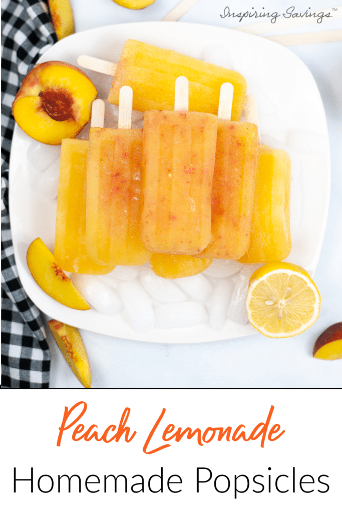 Peach Lemonade Popsicles stacked on white plate with peaches and lemons
