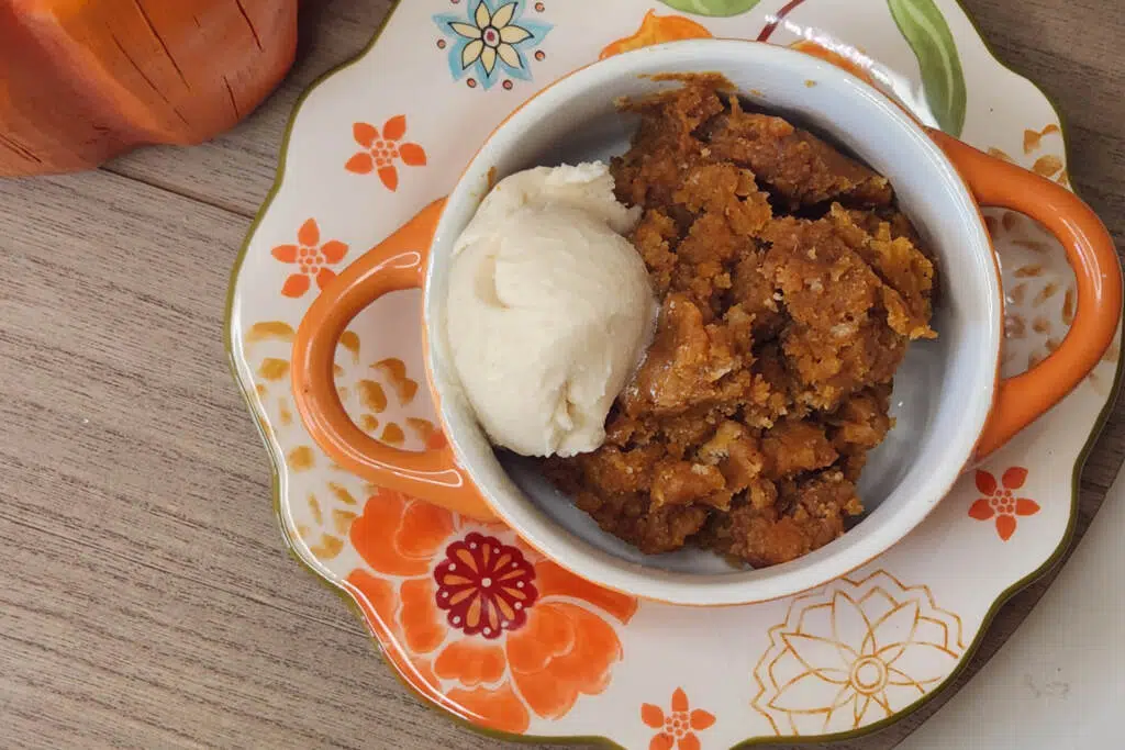 pumpkin bread pudding on wood background