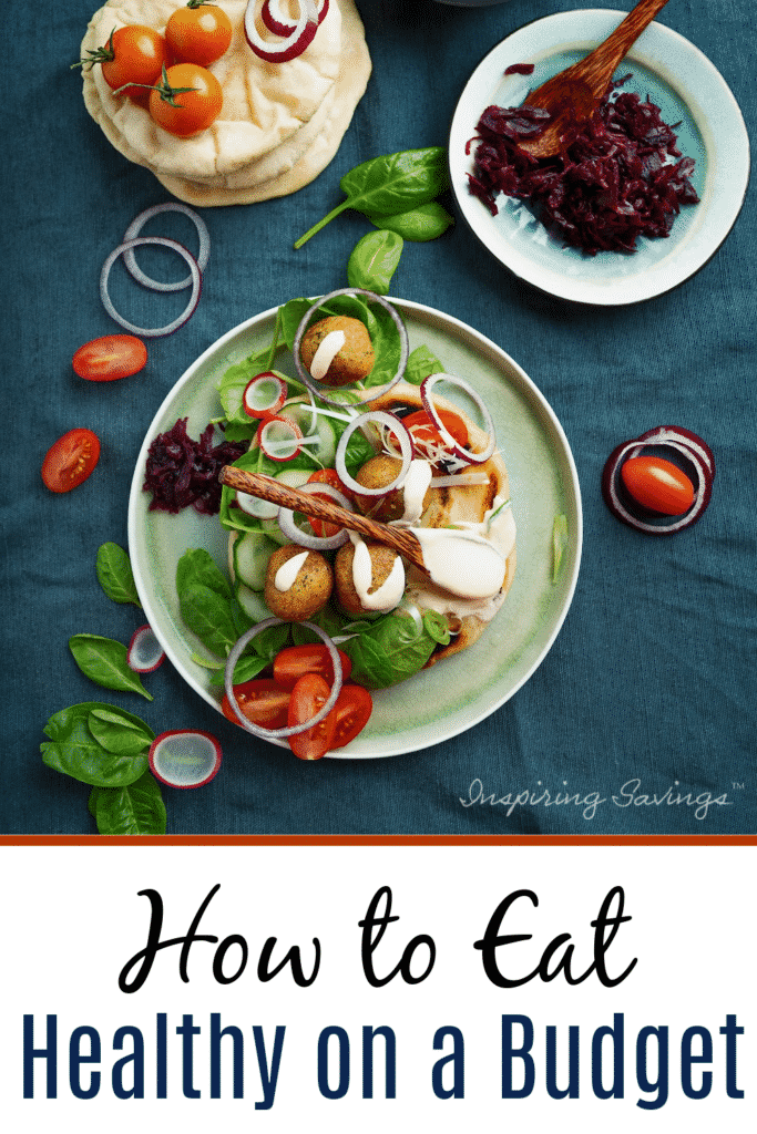 Delicious meal on the table with text overlay- How to eat healthy on a budget