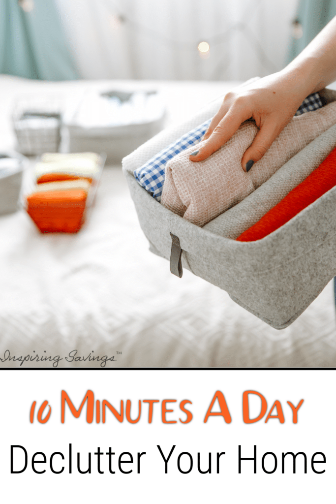 10 minutes a day declutter your home - pictured woman organizing towels in a basket
