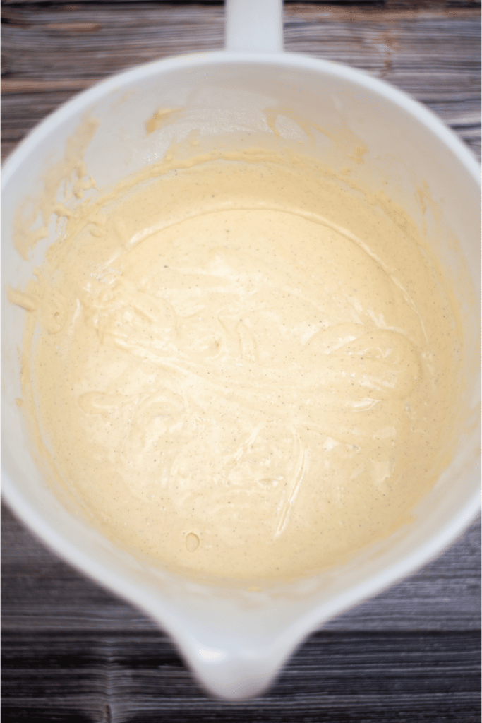 eggnog pancake batter in white mixing bowl
