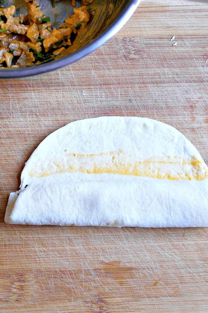 rolling the tortilla