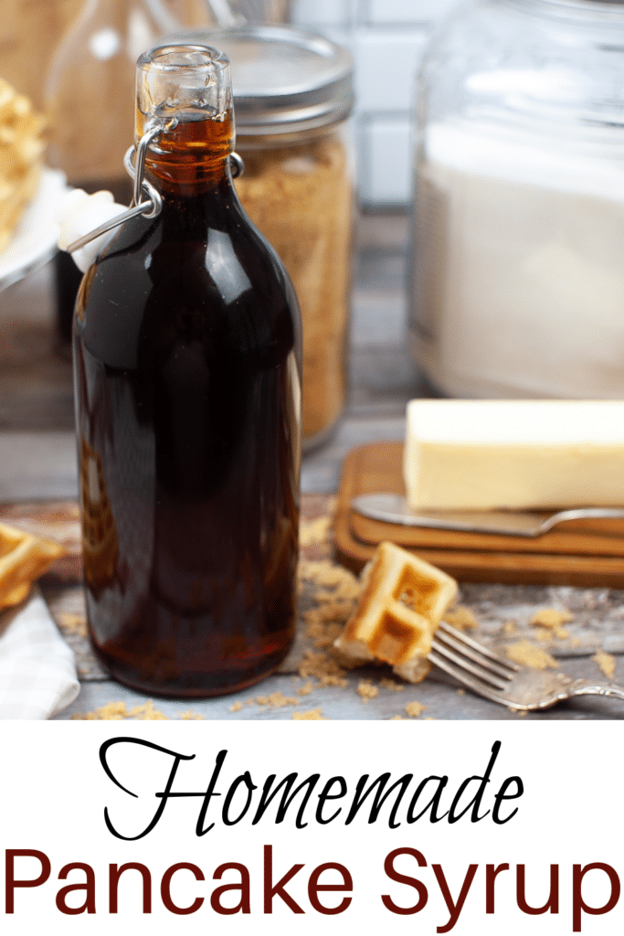 Easy Homemade Pancake Syrup - pictured syrup in flip top container with waffle peices and fresh butter