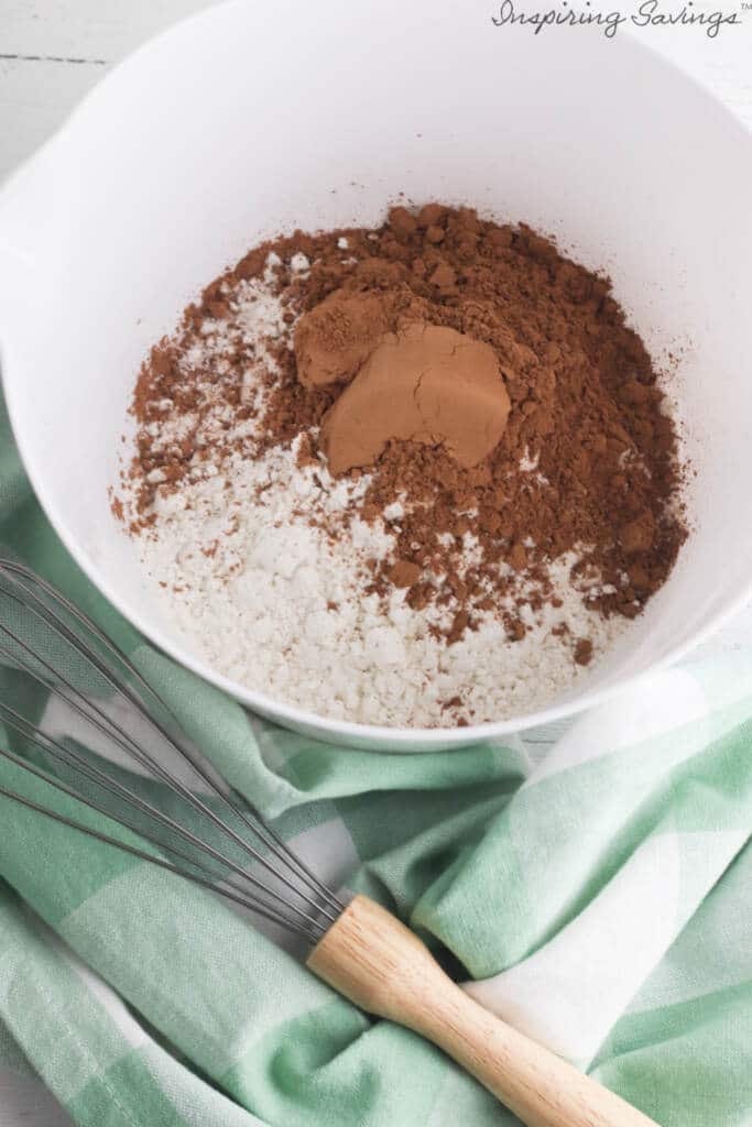 Mixing dry ingredients together for chocolate sable cookies