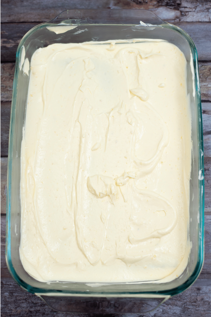 Pudding layer for cake - laying the cake in glass casserole baking dish