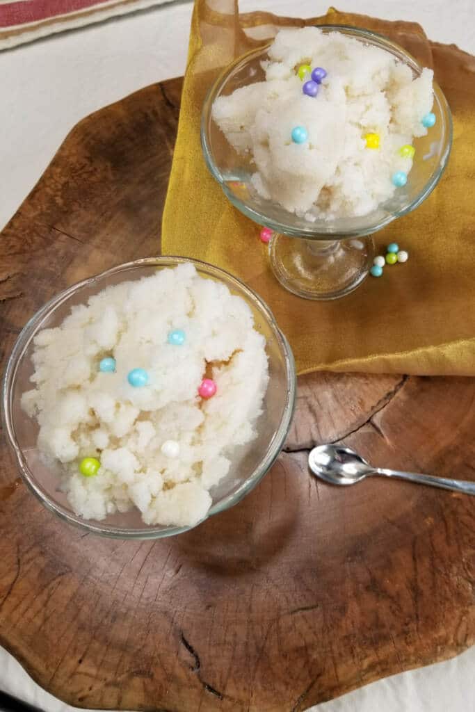 Snow Ice cream with Sprinkles on wooden background