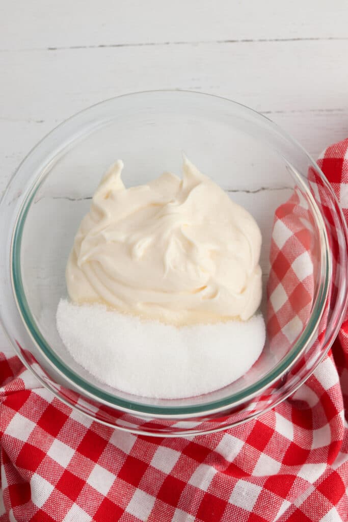 Creating dressing for Salad. Pictured ingredients in clear large bowl