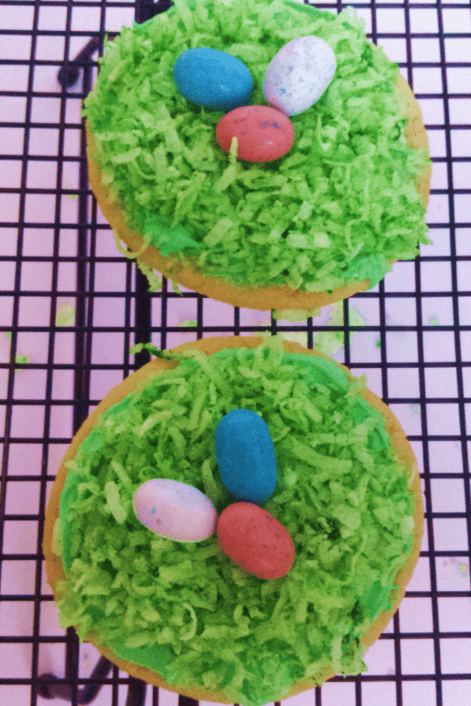 Finished decorated Easter Cookies on wire rack. sugar cookie success