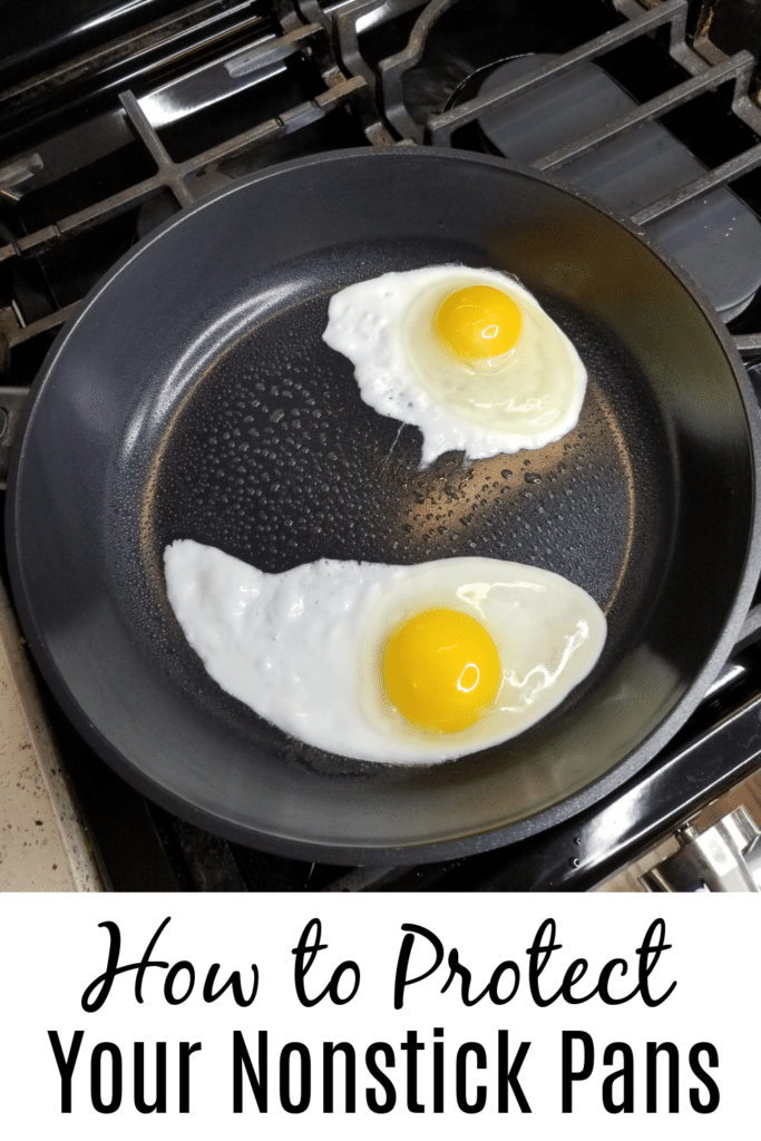 How to protect your nonstick pans - pictured skillet with two eggs cooking on stove top