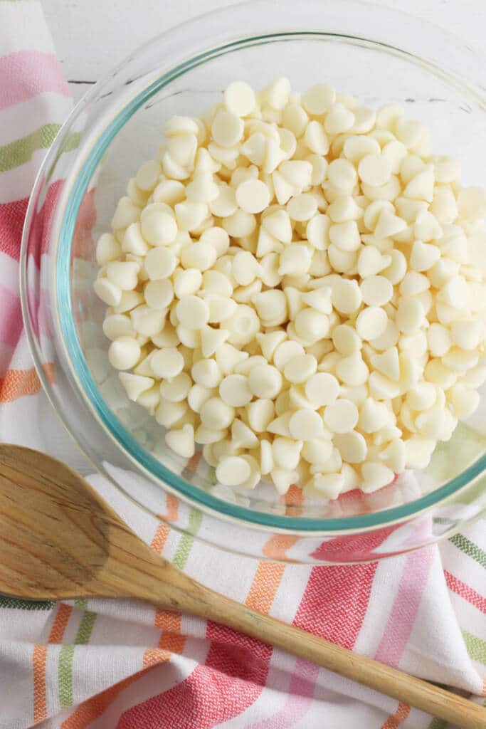 Melting white chocolate in clear glass bowl for Hot cocoa bombs