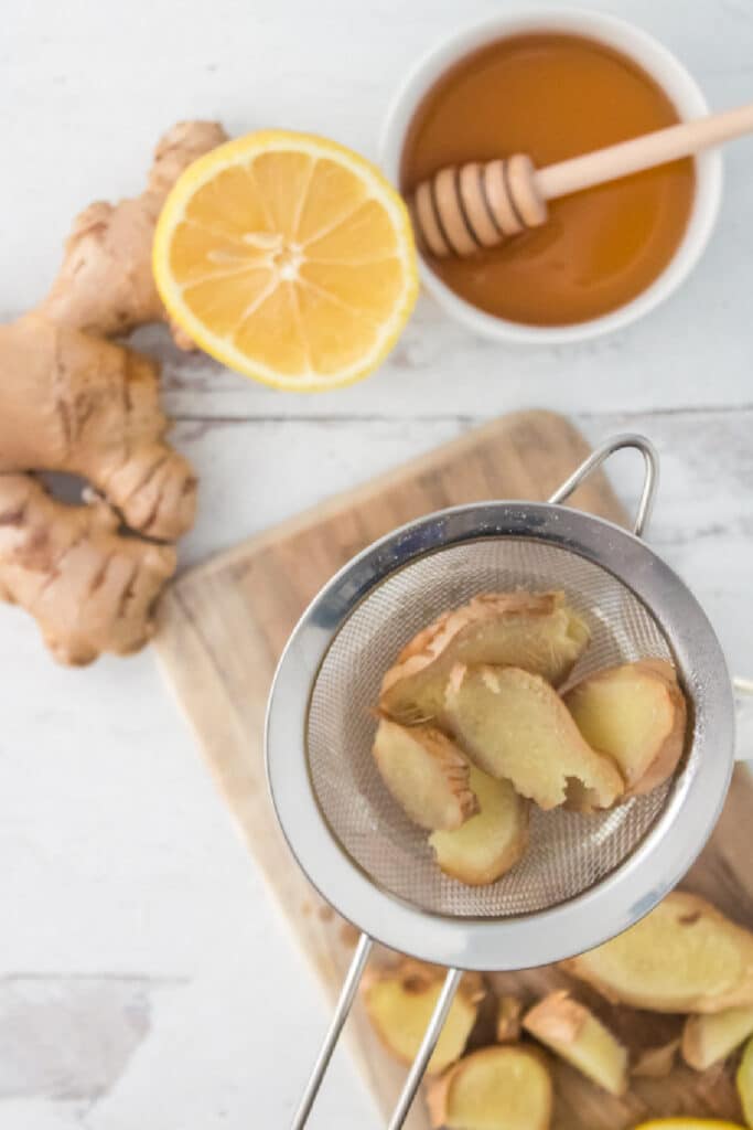 Straining Ginger to make ginger tea