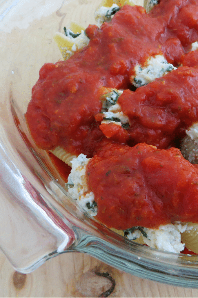 Stuffing shells with filling in glass pan