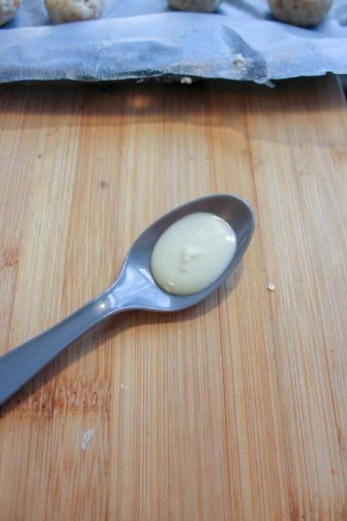 White chocolate on spoon