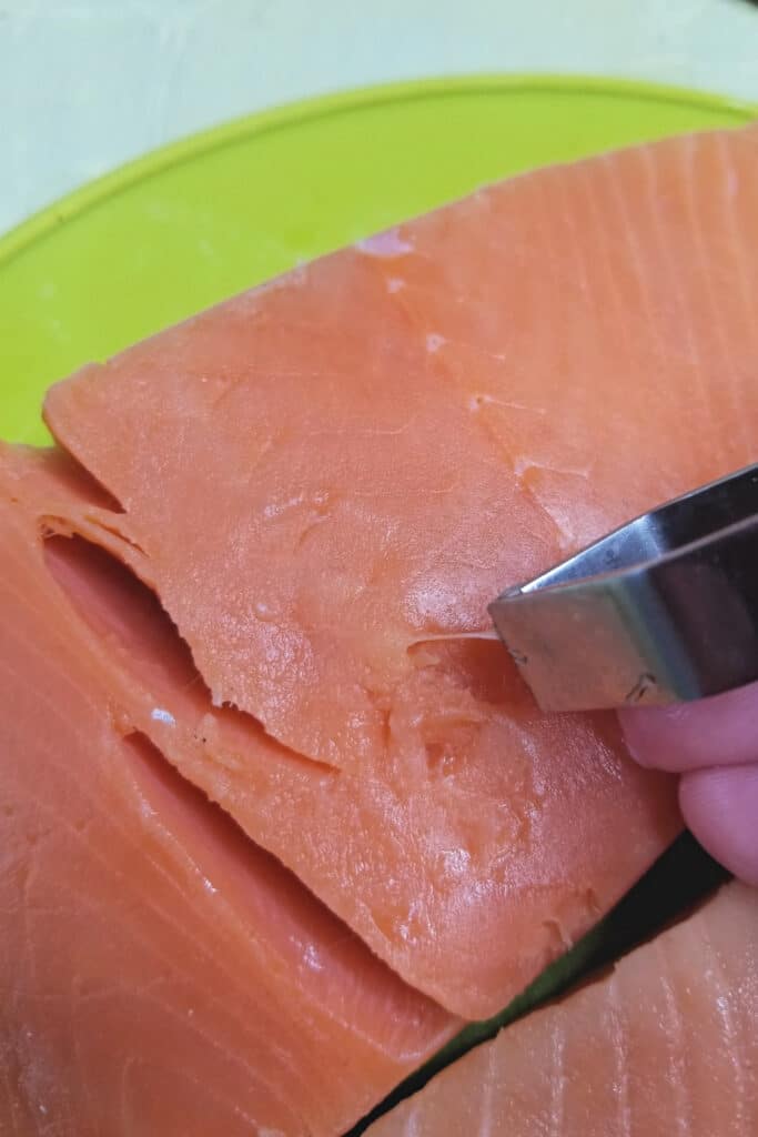 pulling salmon pin bones in filet