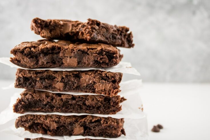 Starbucks Chunk Brownies in between parchment paper