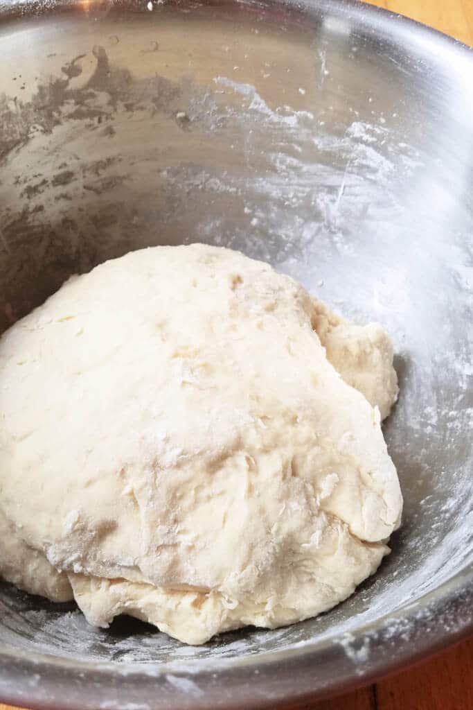 dough ball in bowl ready to be proofed