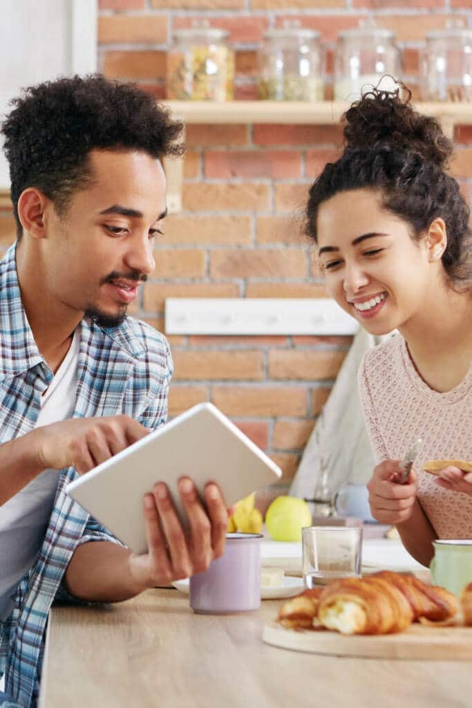 happy couple shopping online