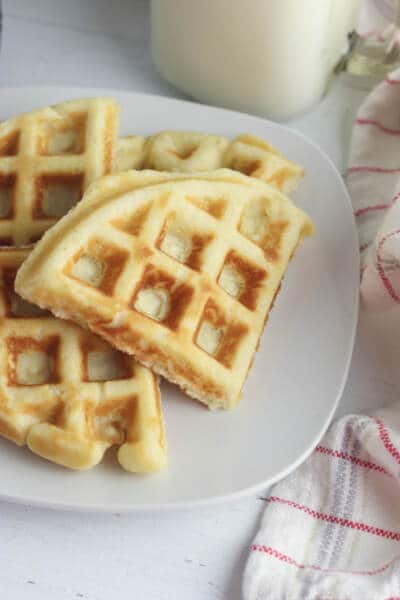homemade gluten free waffles on white plate